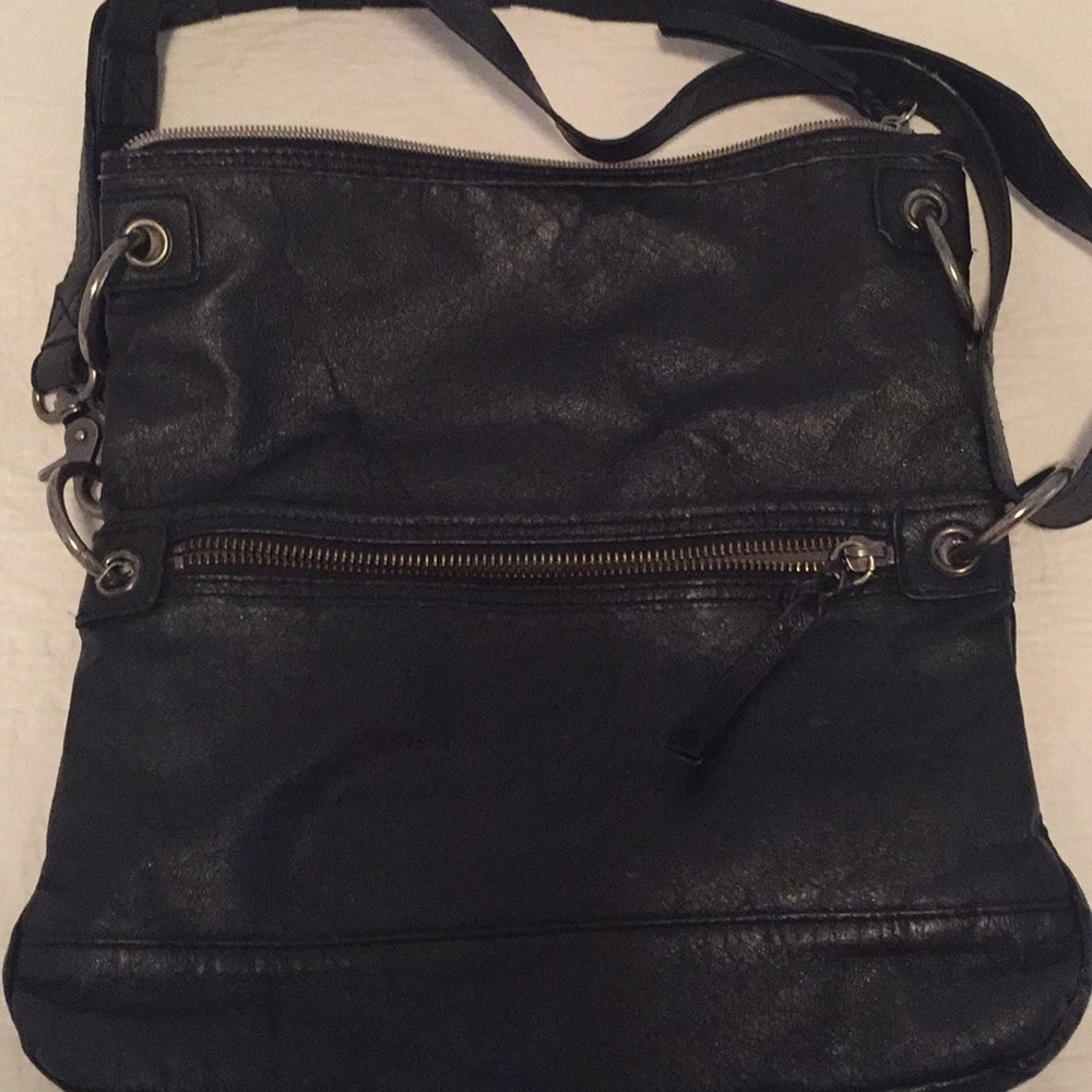 Leather sak bag. 11”x 11” or folds to 11” x 7”